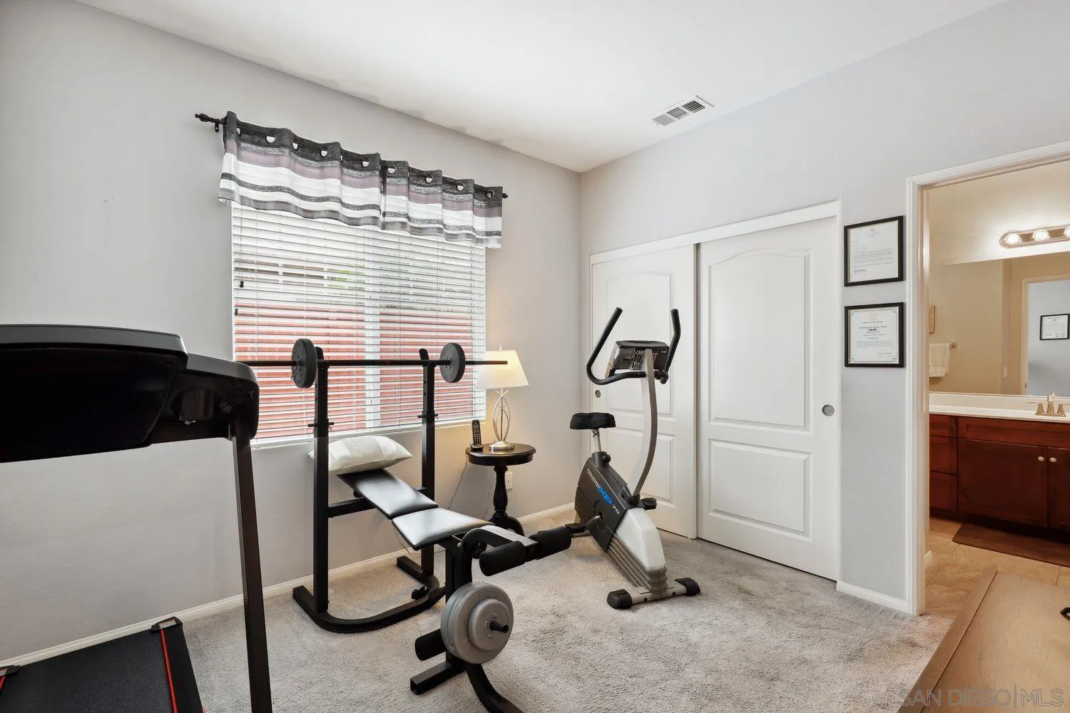 3250 Beven Drive Escondido, CA 92027 - Photo 19 of 34 a view of a workspace with furniture and a window