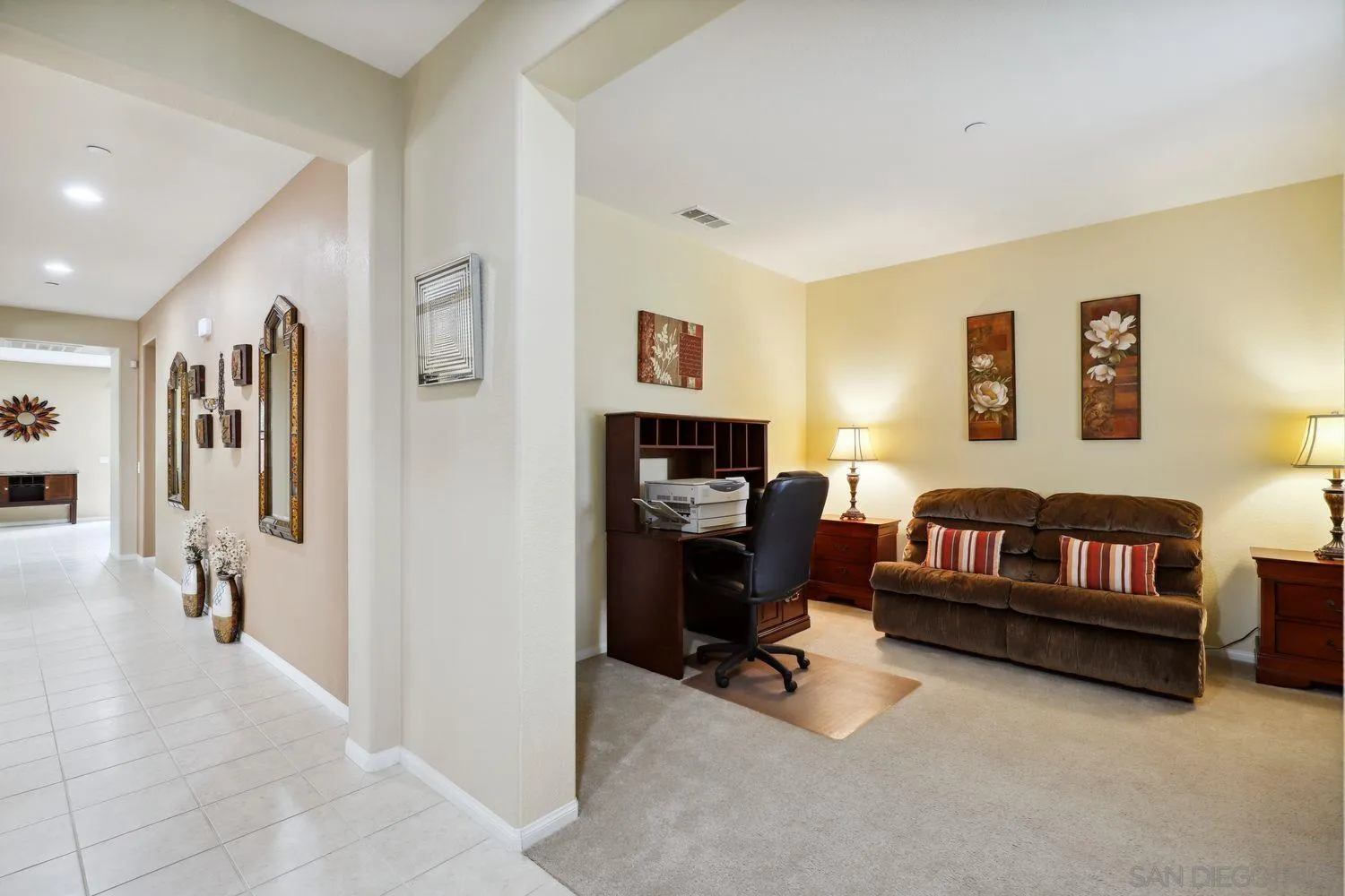 3250 Beven Drive Escondido, CA 92027 - Photo 22 of 34 a living room with furniture and a flat screen tv