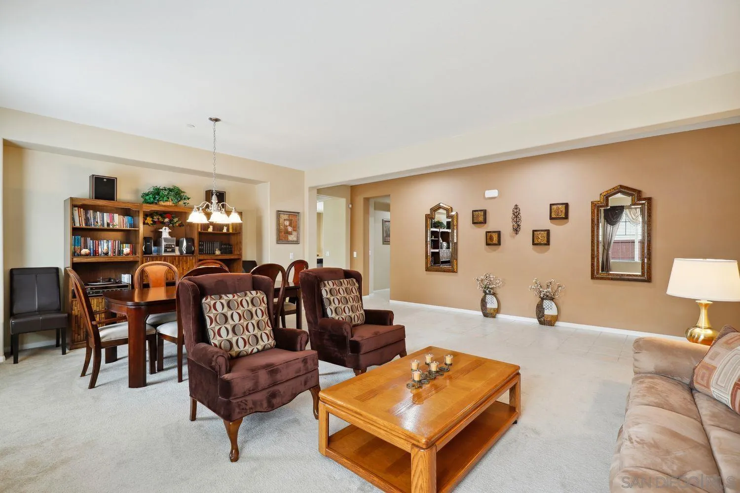 3250 Beven Drive Escondido, CA 92027 - Photo 3 of 34 a living room with furniture a rug and a lamp