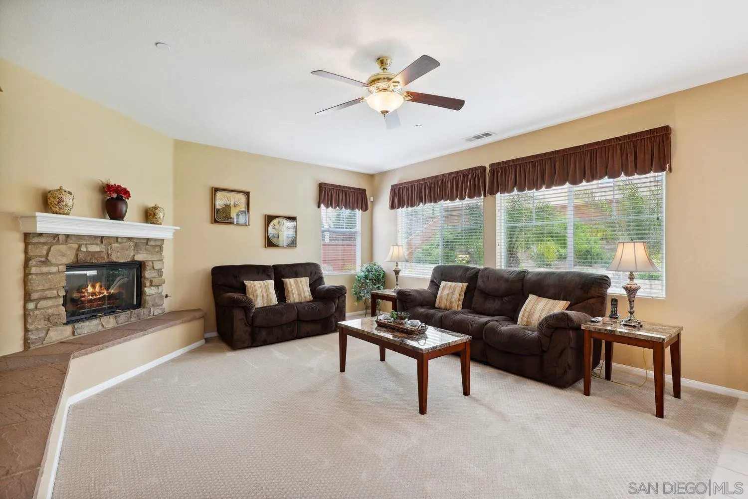 3250 Beven Drive Escondido, CA 92027 - Photo 5 of 34 a living room with furniture and a large window