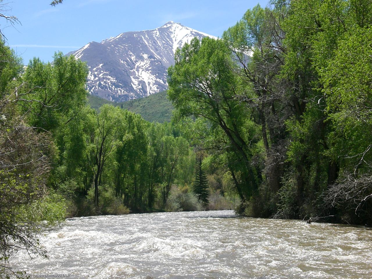 860 Thomas Road Carbondale, CO 81623 - Photo 4 of 15 Crystal River swollen w/spring run-off