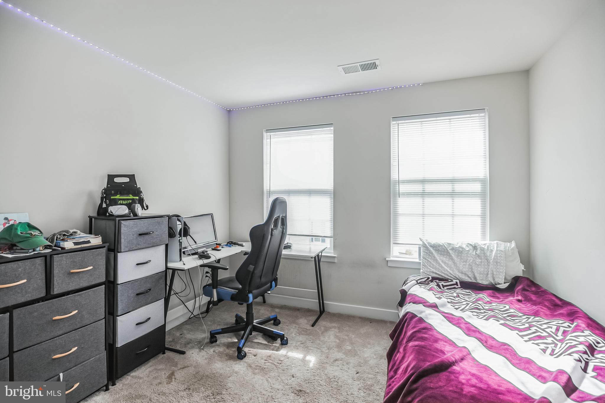 28 Sparrow Circle Sewell, NJ 08080 - Photo 11 of 15 a view of a workspace with a window and lounge chair