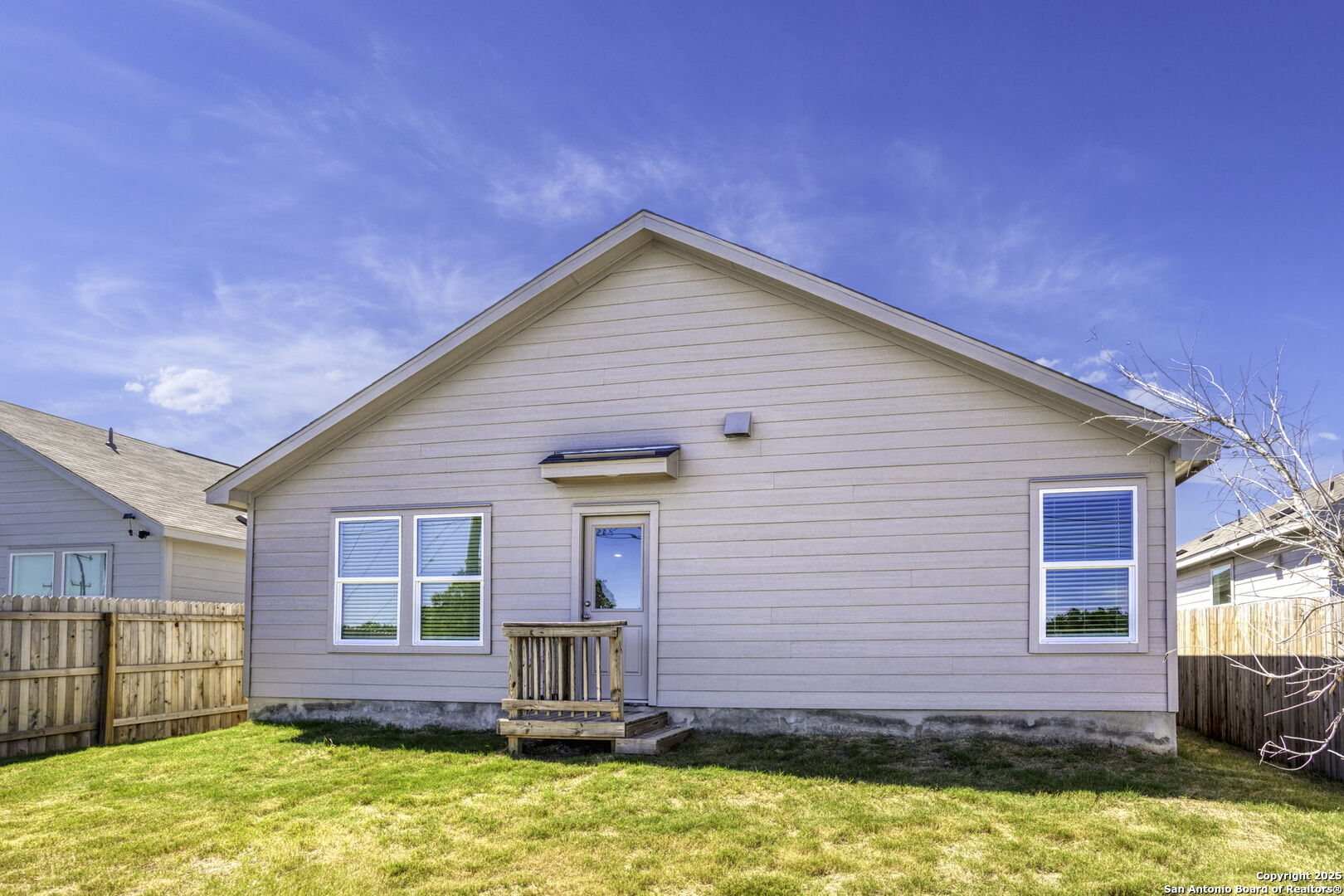 31838 Cherry Bulverde, TX 78163 - Photo 18 of 19 a view of a house with a swimming pool