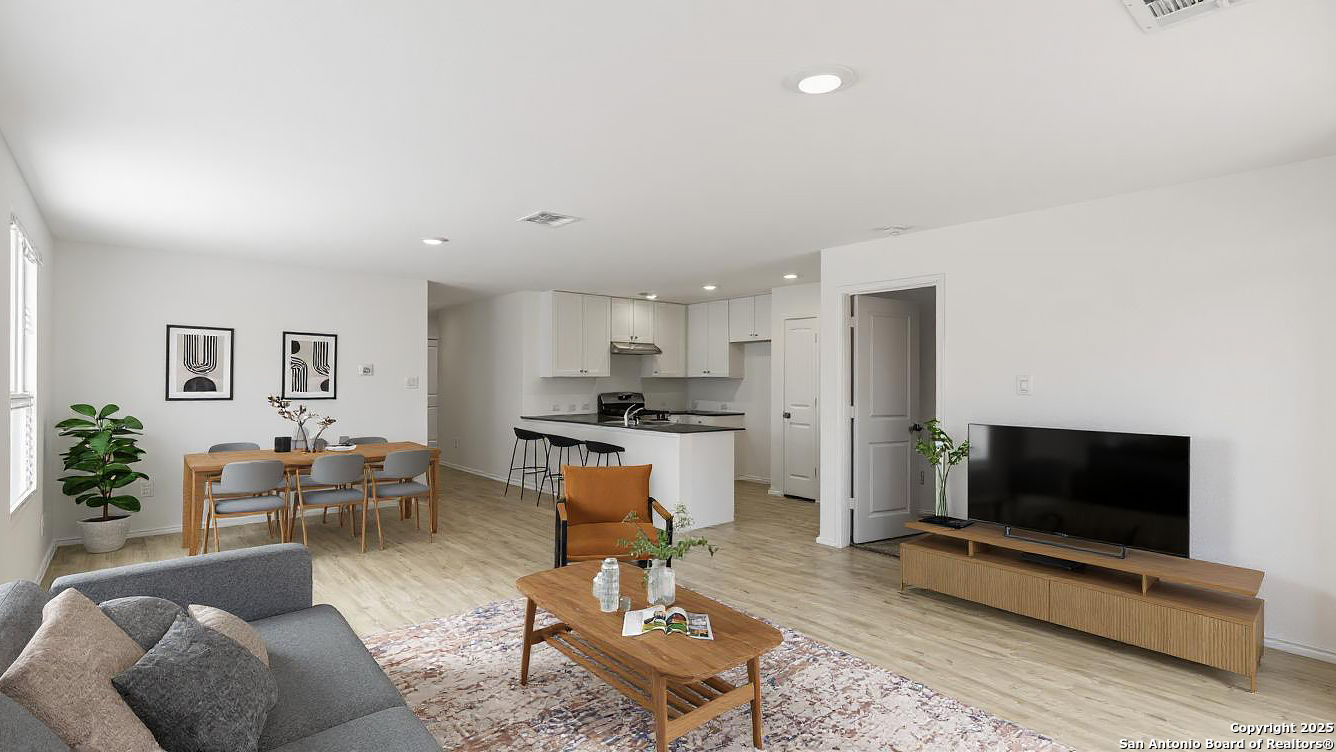 31838 Cherry Bulverde, TX 78163 - Photo 5 of 19 a living room with furniture and a flat screen tv