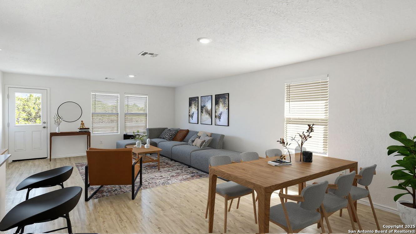 31838 Cherry Bulverde, TX 78163 - Photo 7 of 19 a living room with furniture a window and a table