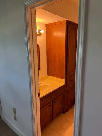 a bathroom with a tub and vanity