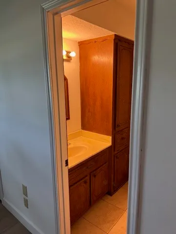 a bathroom with a tub and vanity