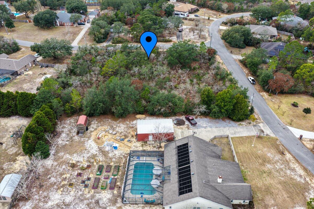 0 Bone Bluff Drive Navarre, FL 32566 - Photo 6 of 7 an aerial view of a house with a yard