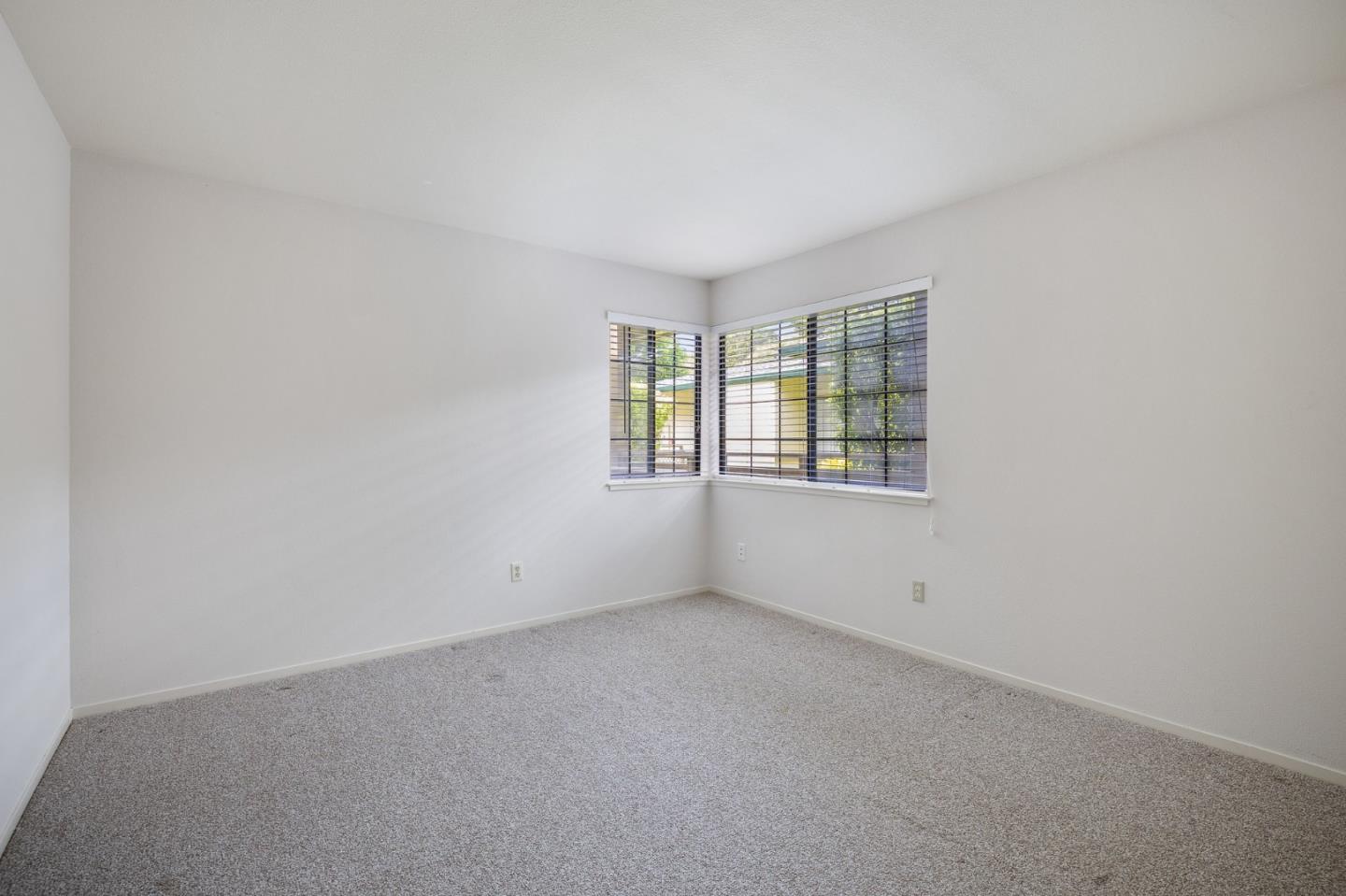 130 Pheasant Ridge Road Del Rey Oaks, CA 93940 - Photo 12 of 23 an empty room with windows