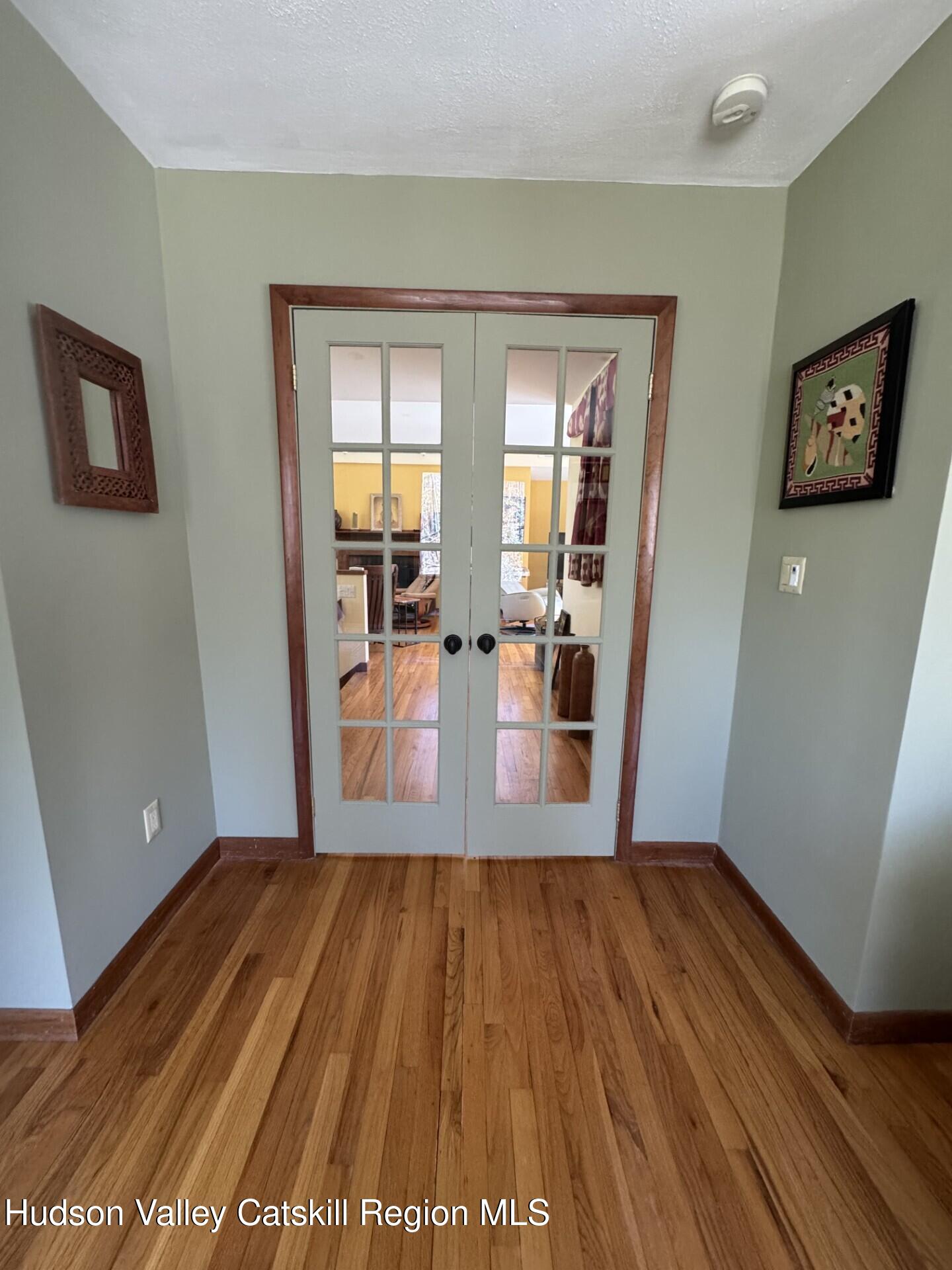 115 Jones Quarry Road Woodstock, NY 12498 - Photo 19 of 38 a view of a living room and hardwood floor