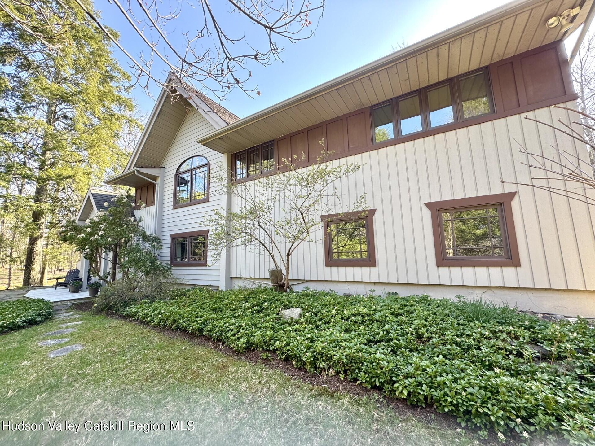115 Jones Quarry Road Woodstock, NY 12498 - Photo 5 of 38 a front view of a house with a yard