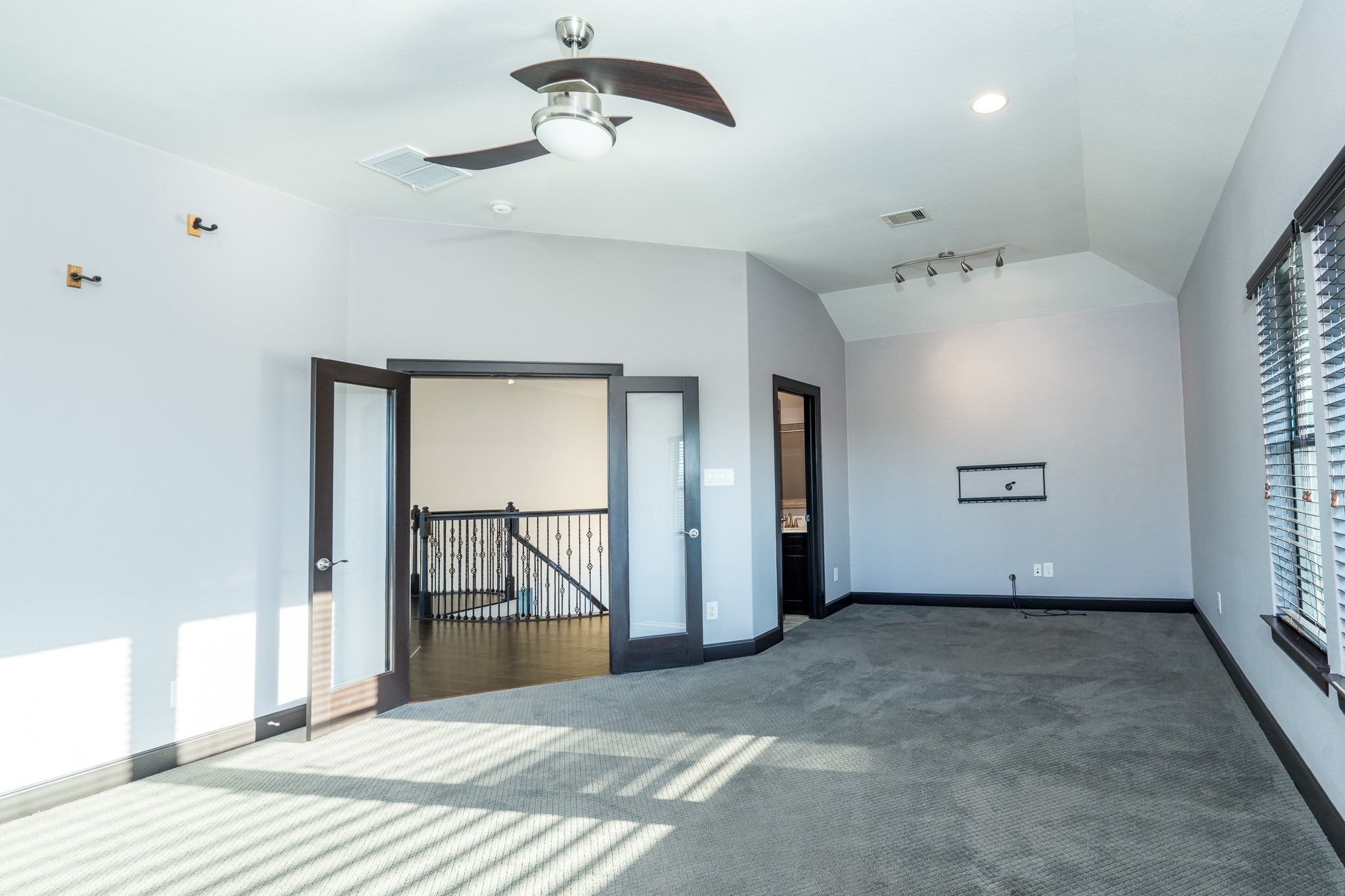 12748 Roy Road Pearland, TX 77581 - Photo 40 of 50 Game room or flex to a media room with French doors and its own half bath.