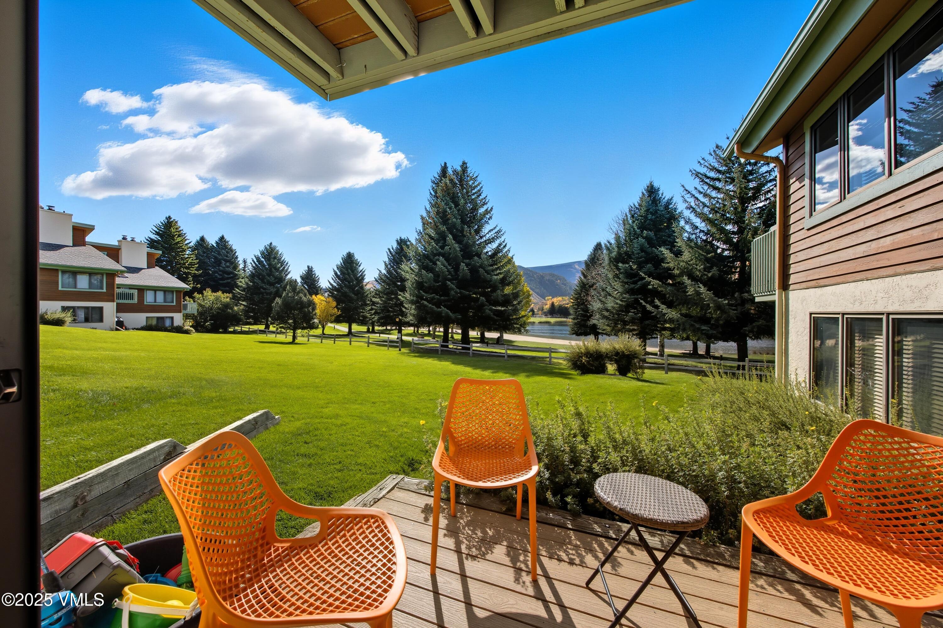 520 West Beaver Creek Boulevard, Unit A103 Avon, CO 81620 - Photo 13 of 21 a view of swimming pool and chairs in backyard