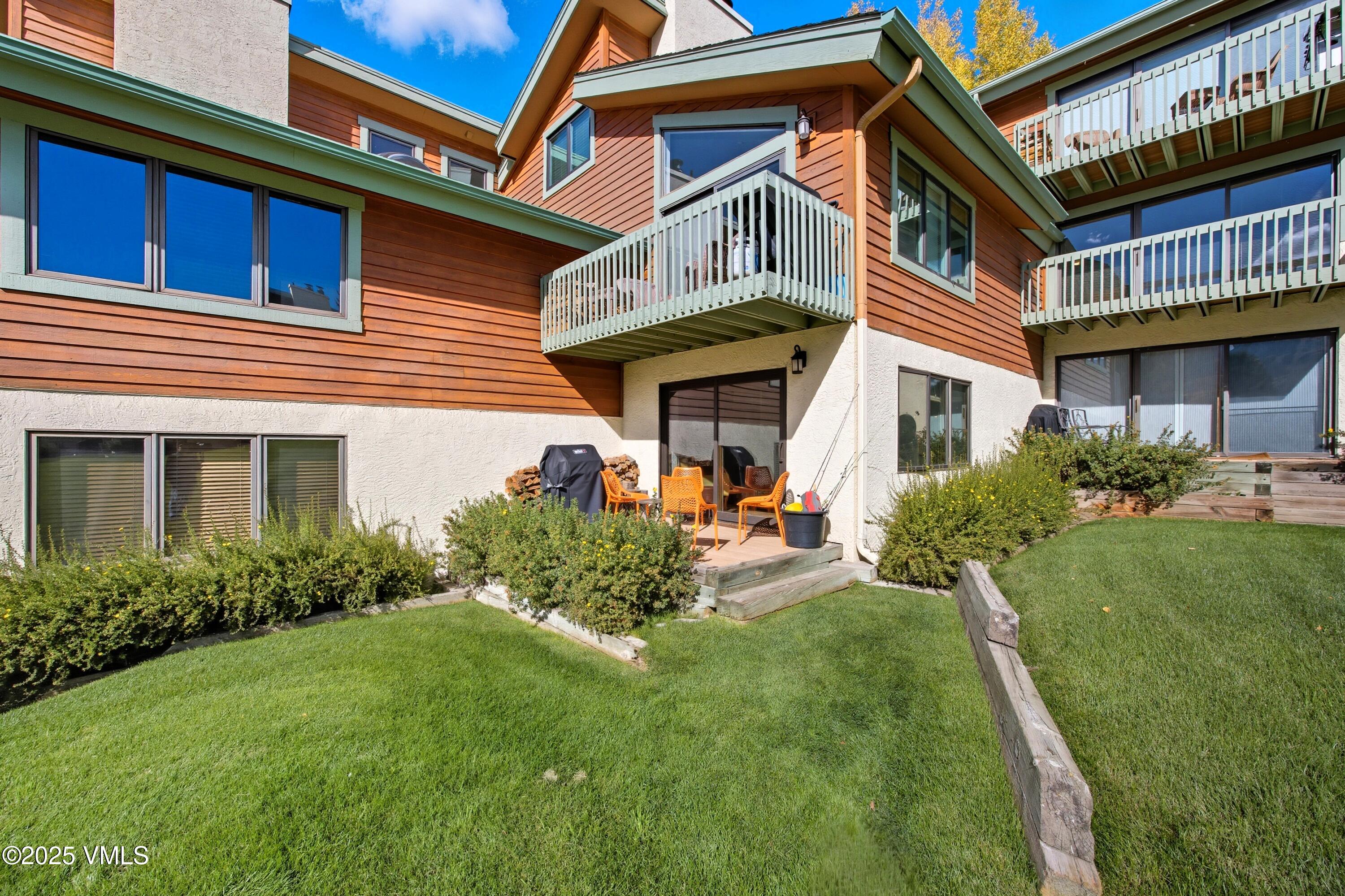 520 West Beaver Creek Boulevard, Unit A103 Avon, CO 81620 - Photo 14 of 21 a view of a house with a yard porch and furniture