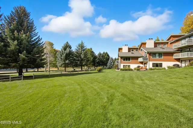 a view of a house with a big yard