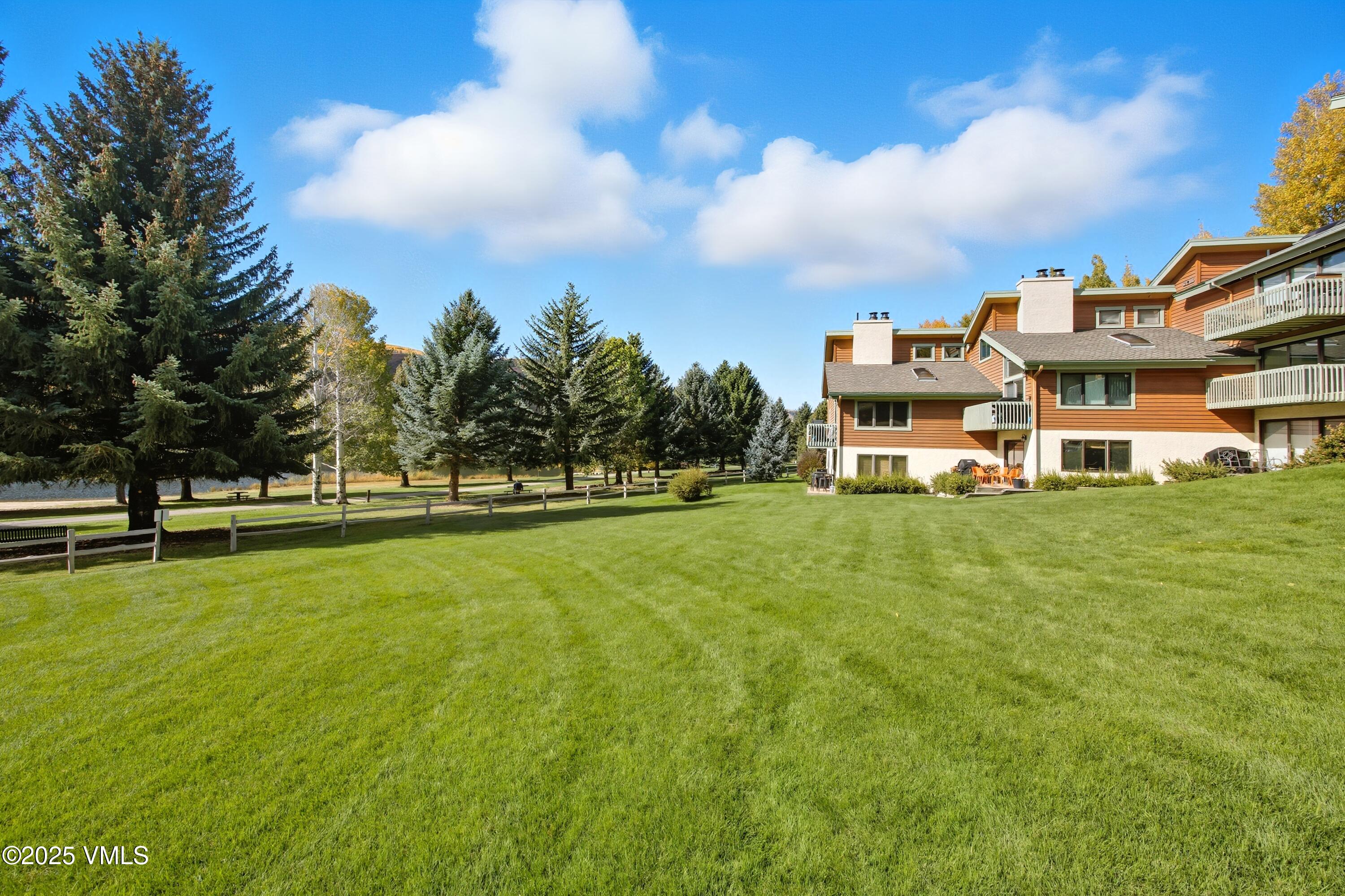 520 West Beaver Creek Boulevard, Unit A103 Avon, CO 81620 - Photo 15 of 21 a view of a house with a big yard