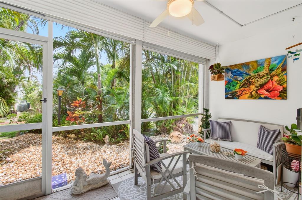 a outdoor living space with furniture and a potted plant