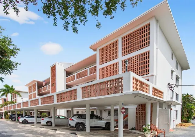 a front view of a building with street view