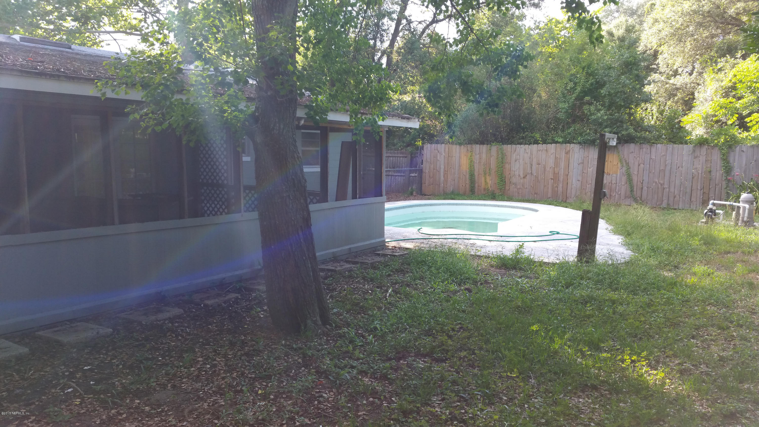 137 Argonaut Road St. Augustine, FL 32086 - Photo 13 of 14 a view of backyard with tree