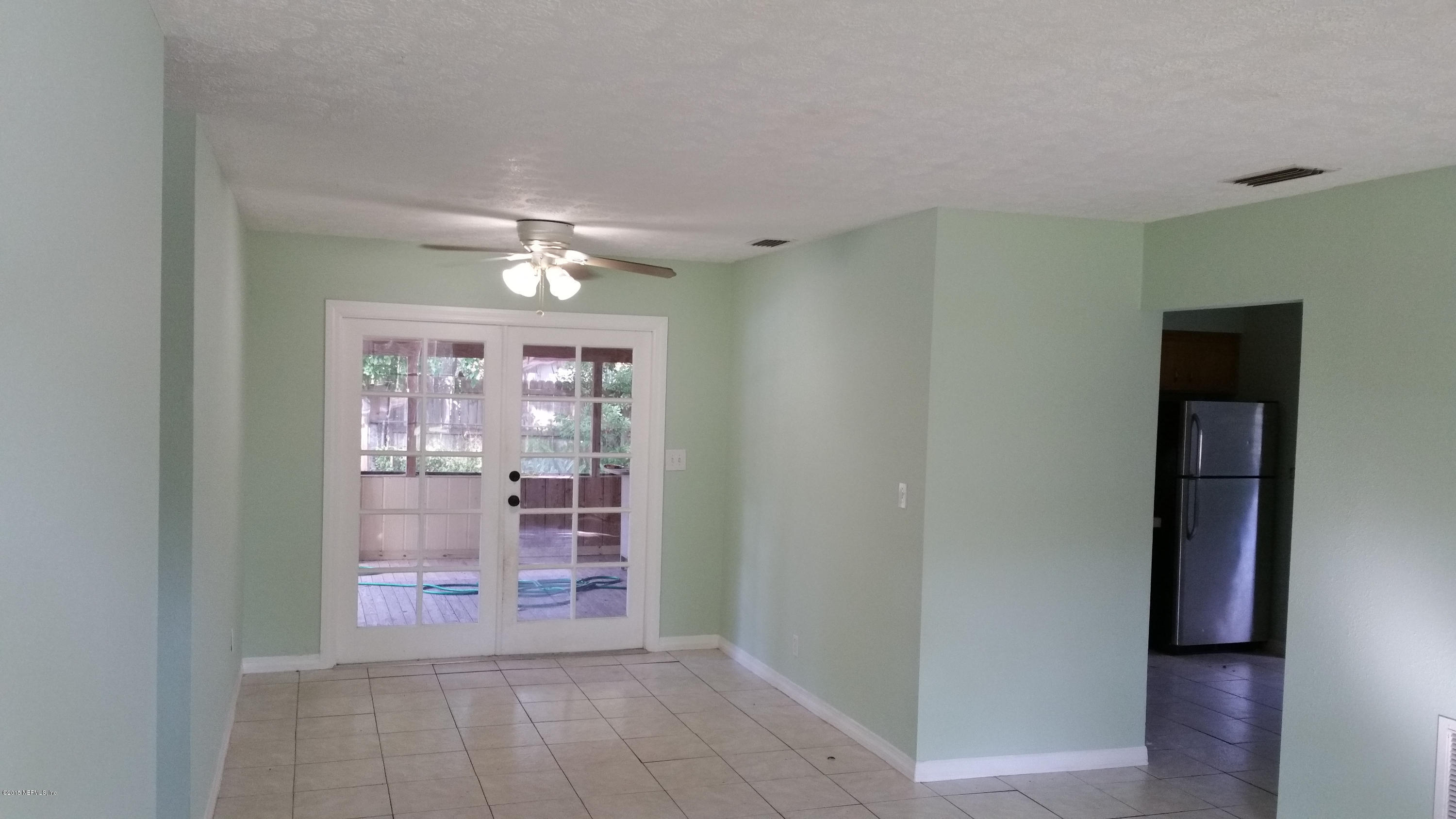 137 Argonaut Road St. Augustine, FL 32086 - Photo 3 of 14 a view of an empty room with a window