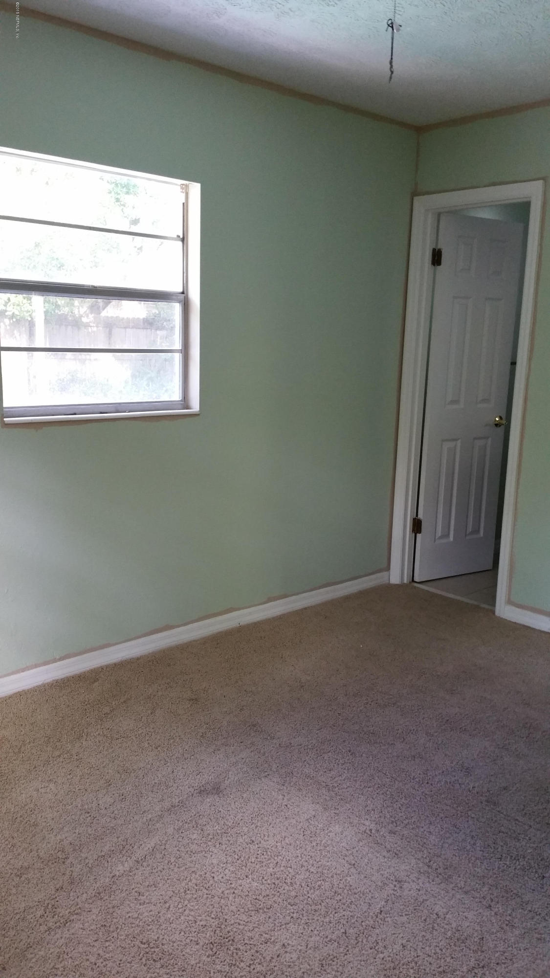 137 Argonaut Road St. Augustine, FL 32086 - Photo 5 of 14 a view of a small space with a window