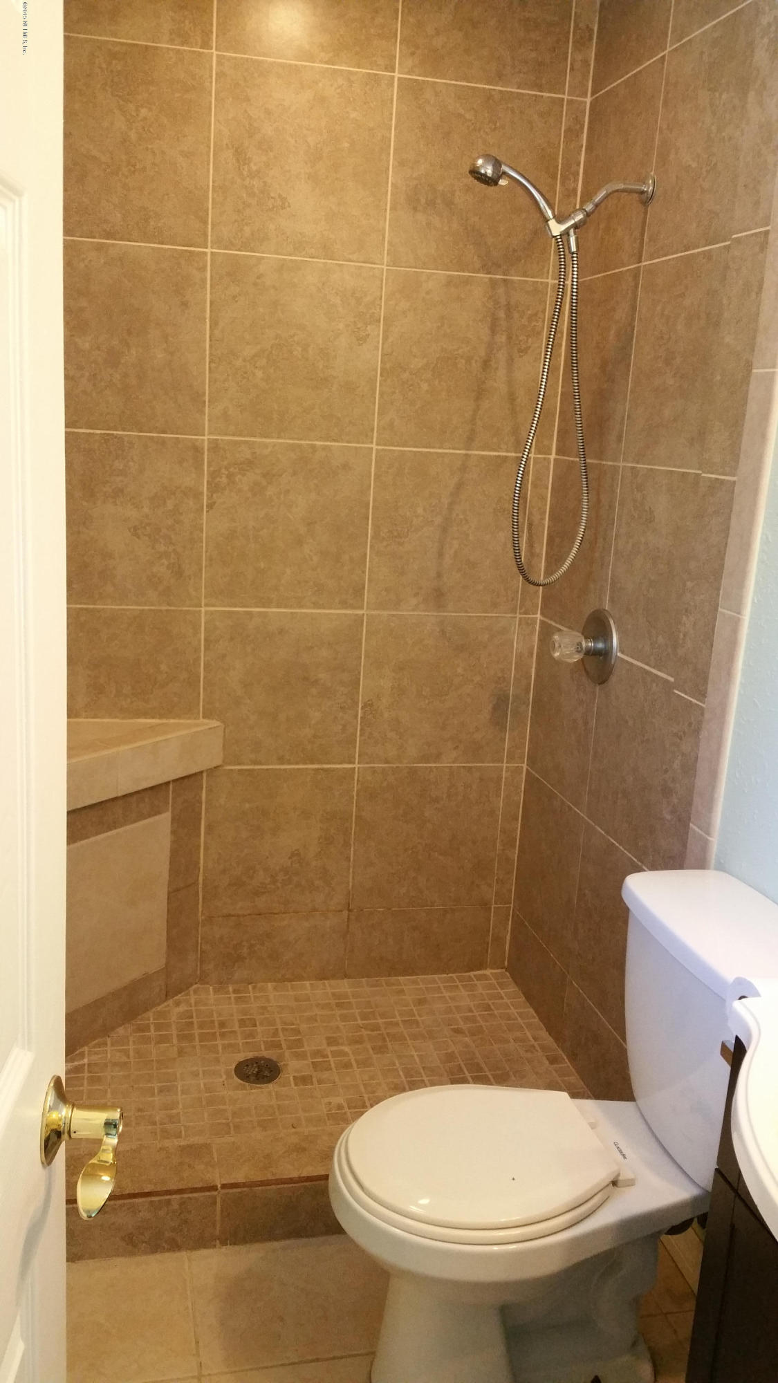 137 Argonaut Road St. Augustine, FL 32086 - Photo 6 of 14 a bathroom with a toilet and a shower