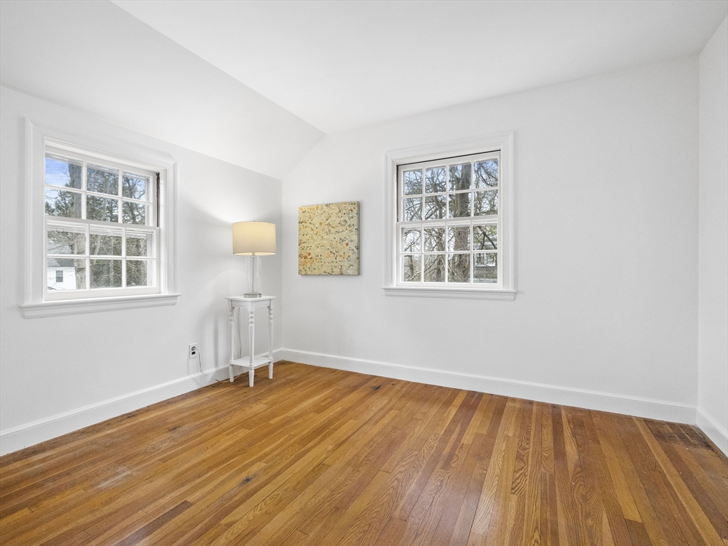 14 Ivy Road Wellesley, MA 02482 - Photo 15 of 22 a view of empty room with wooden floor and fan