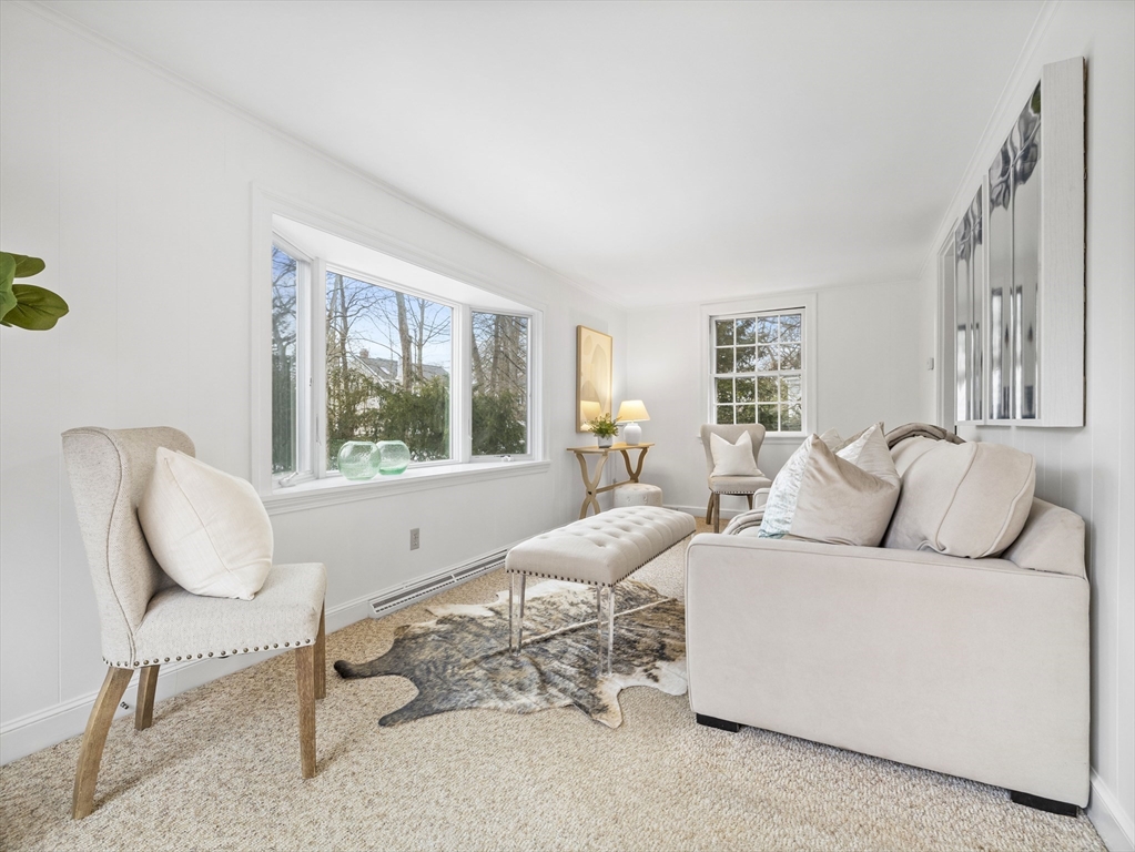 14 Ivy Road Wellesley, MA 02482 - Photo 7 of 22 a living room with furniture and a large window