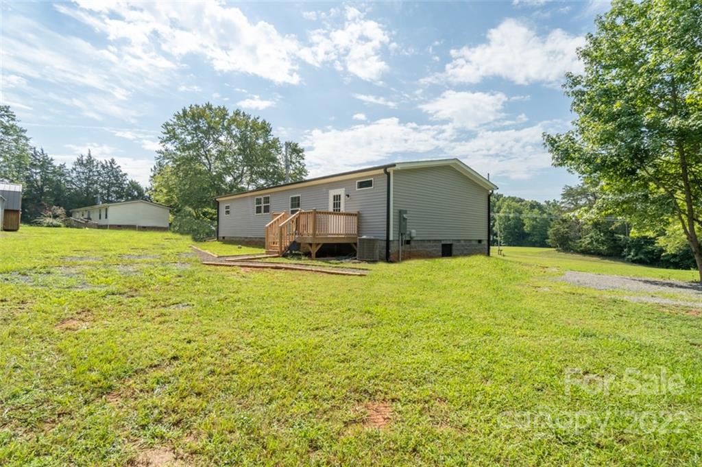 1360 Ridge Road Mocksville, NC 27028 - Photo 6 of 32 a house view with a outdoor space