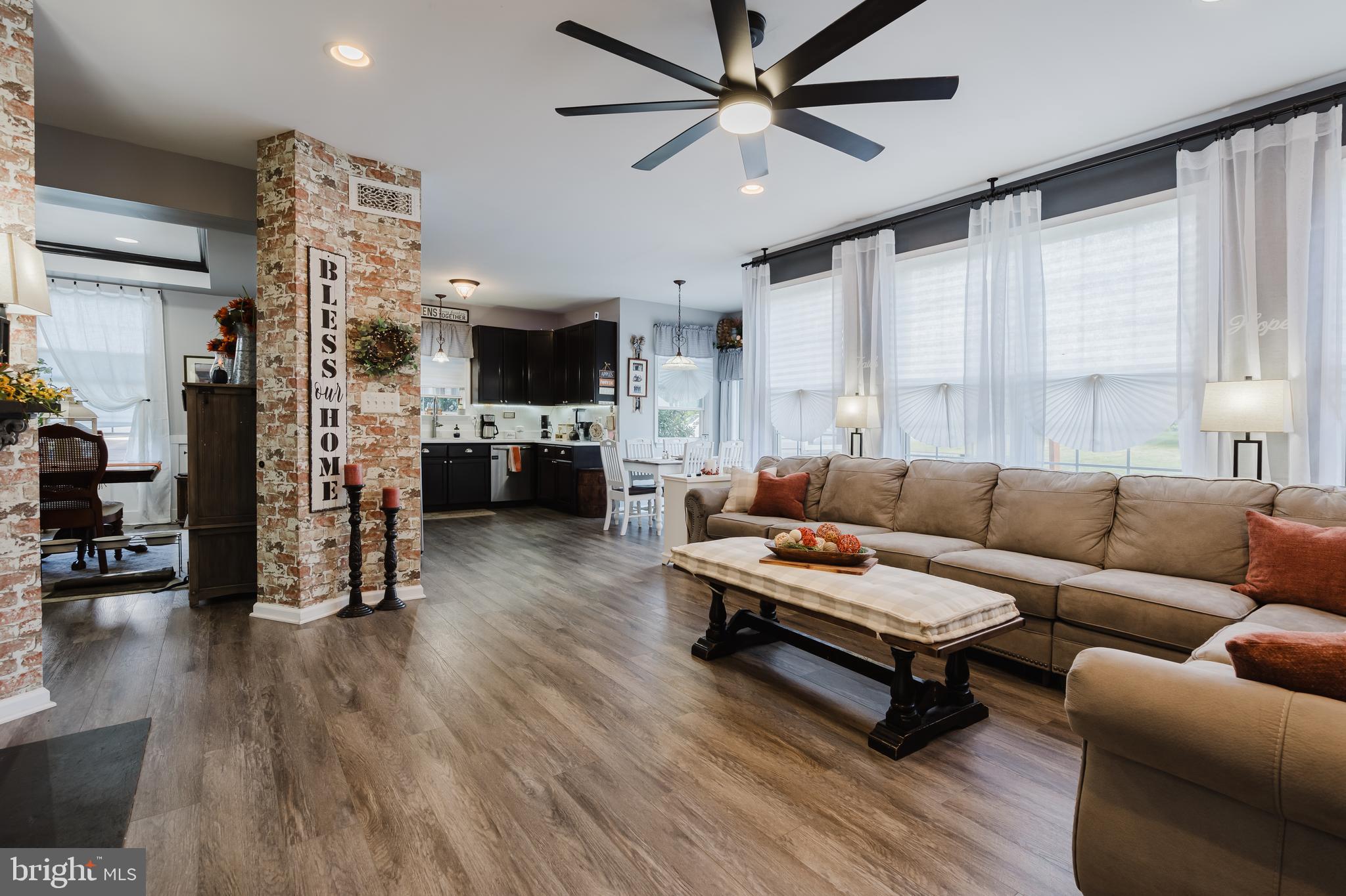 1 Bohemia Road Bear, DE 19701 - Photo 18 of 66 a living room with furniture and a wooden floor