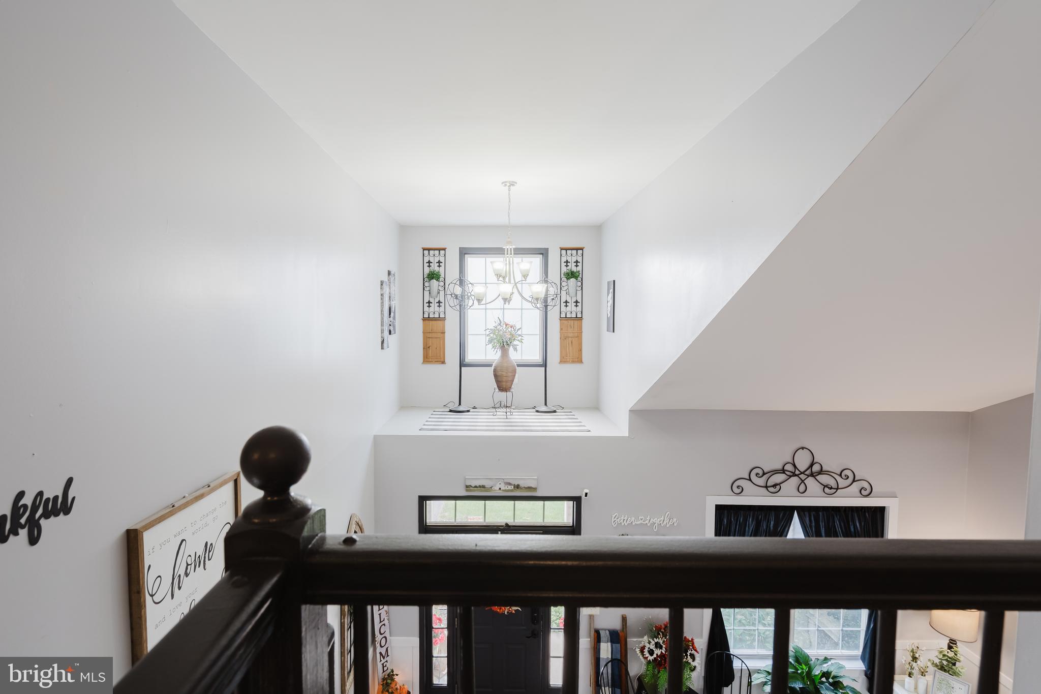 1 Bohemia Road Bear, DE 19701 - Photo 28 of 66 a view of a porch with wooden floor and windows