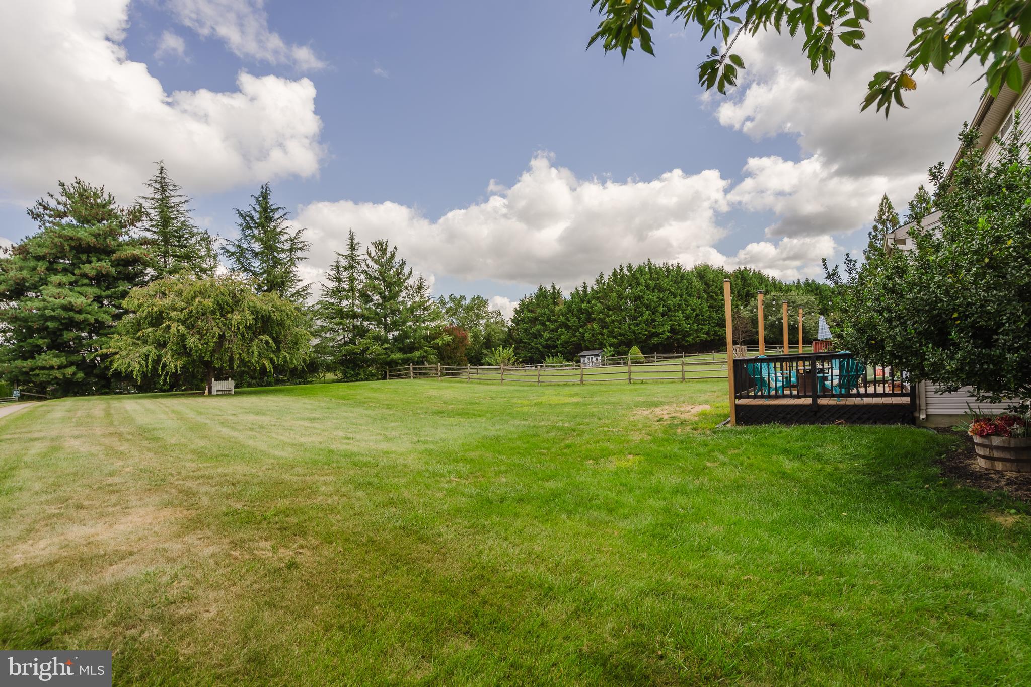 1 Bohemia Road Bear, DE 19701 - Photo 54 of 66 a house with green field in front of it