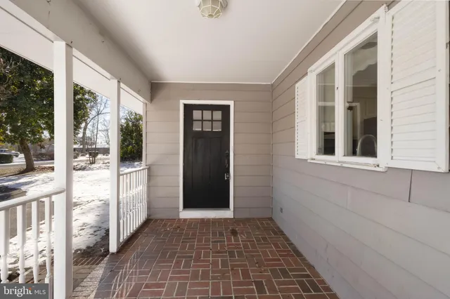 a view of a door and a window
