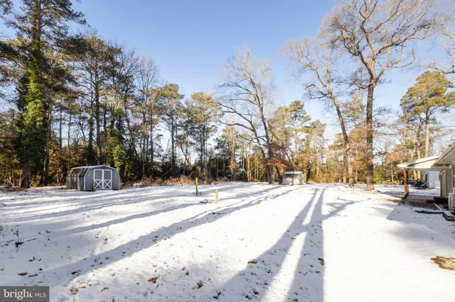 a view of a road with snow on the road
