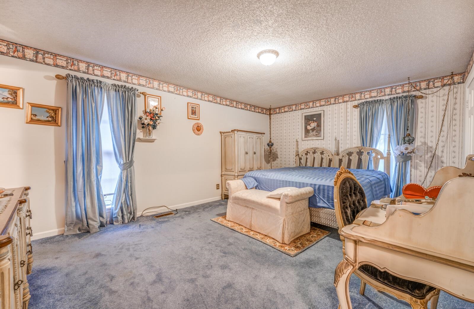 9715 Deadfall Road Brighton, TN 38011 - Photo 14 of 25 a bedroom with bed and a window