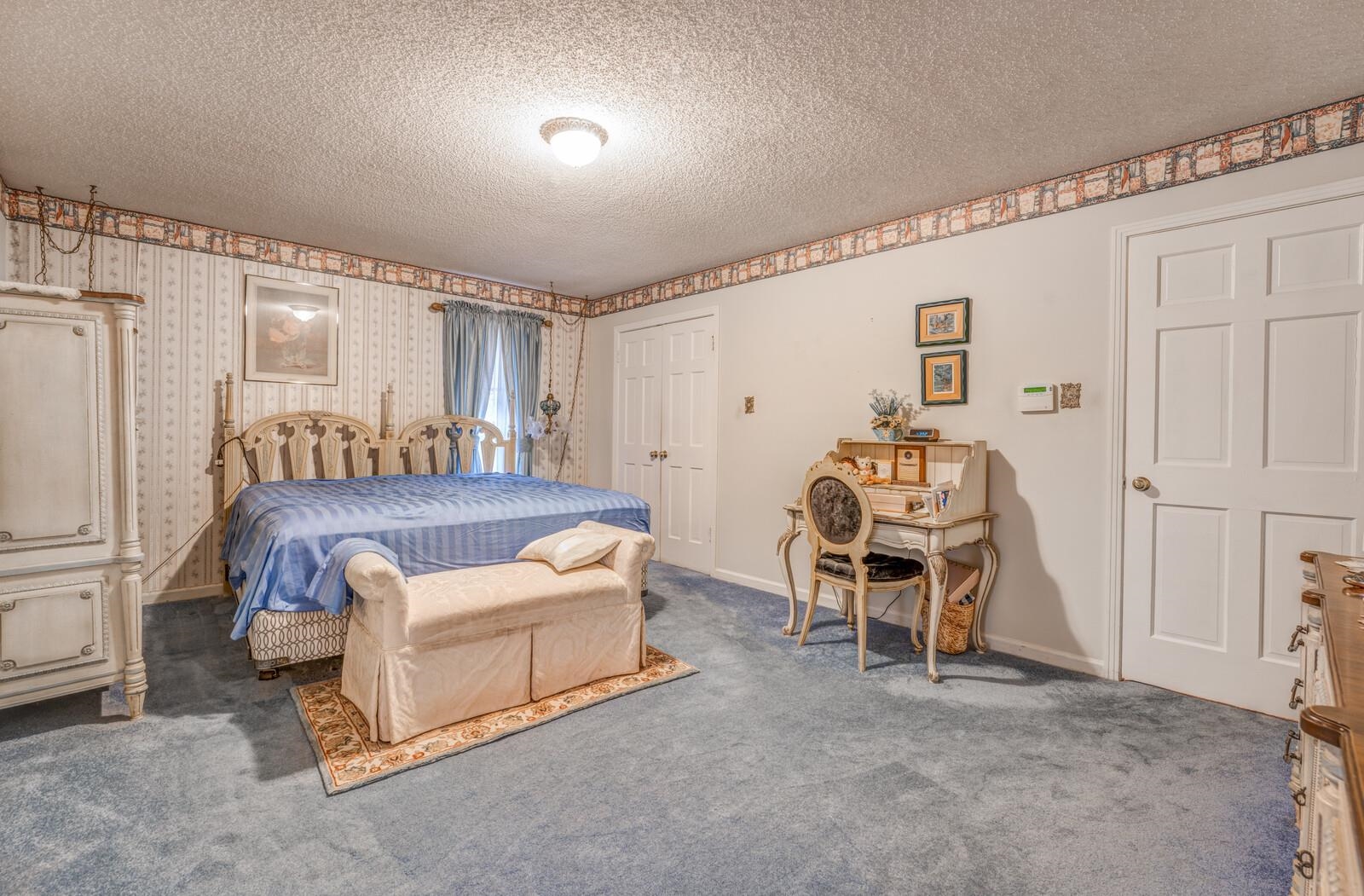 9715 Deadfall Road Brighton, TN 38011 - Photo 15 of 25 a bedroom with furniture and a large window