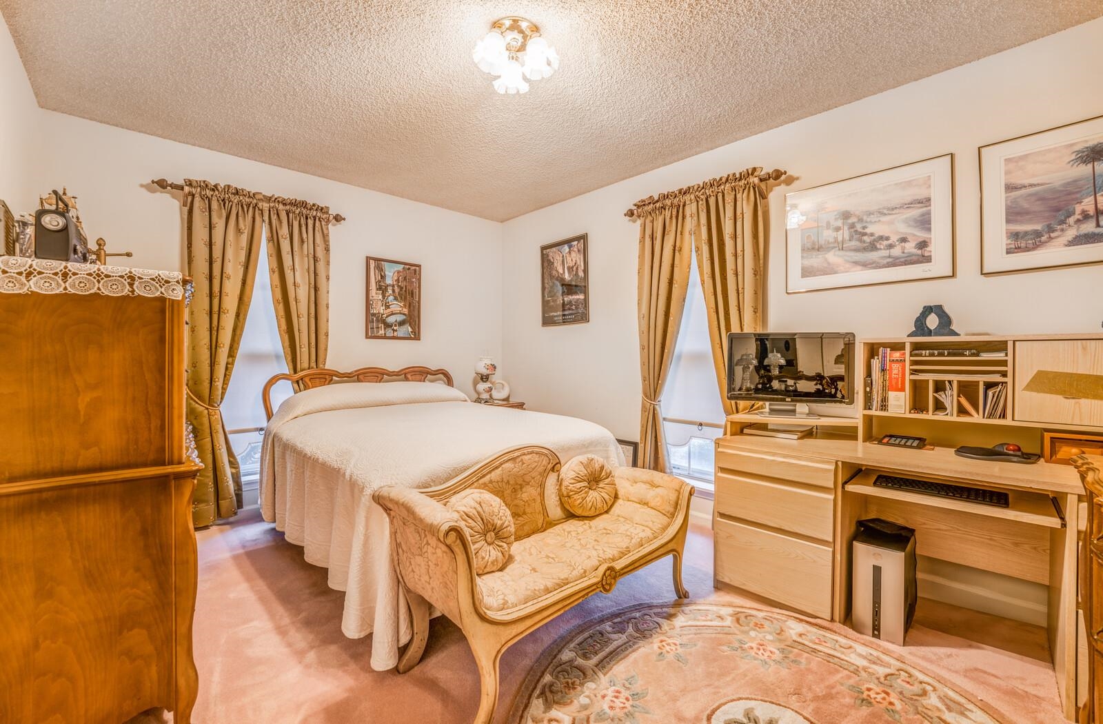 9715 Deadfall Road Brighton, TN 38011 - Photo 19 of 25 a spacious bedroom with a bed and a table in it