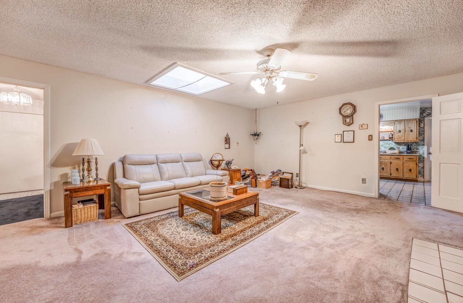 9715 Deadfall Road Brighton, TN 38011 - Photo 9 of 25 a living room with furniture and wooden floor