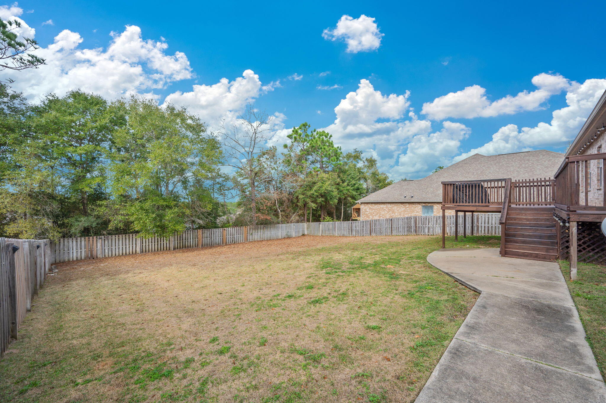 513 Pheasant Trail Crestview, FL 32536 - Photo 34 of 35 a view of a house with backyard