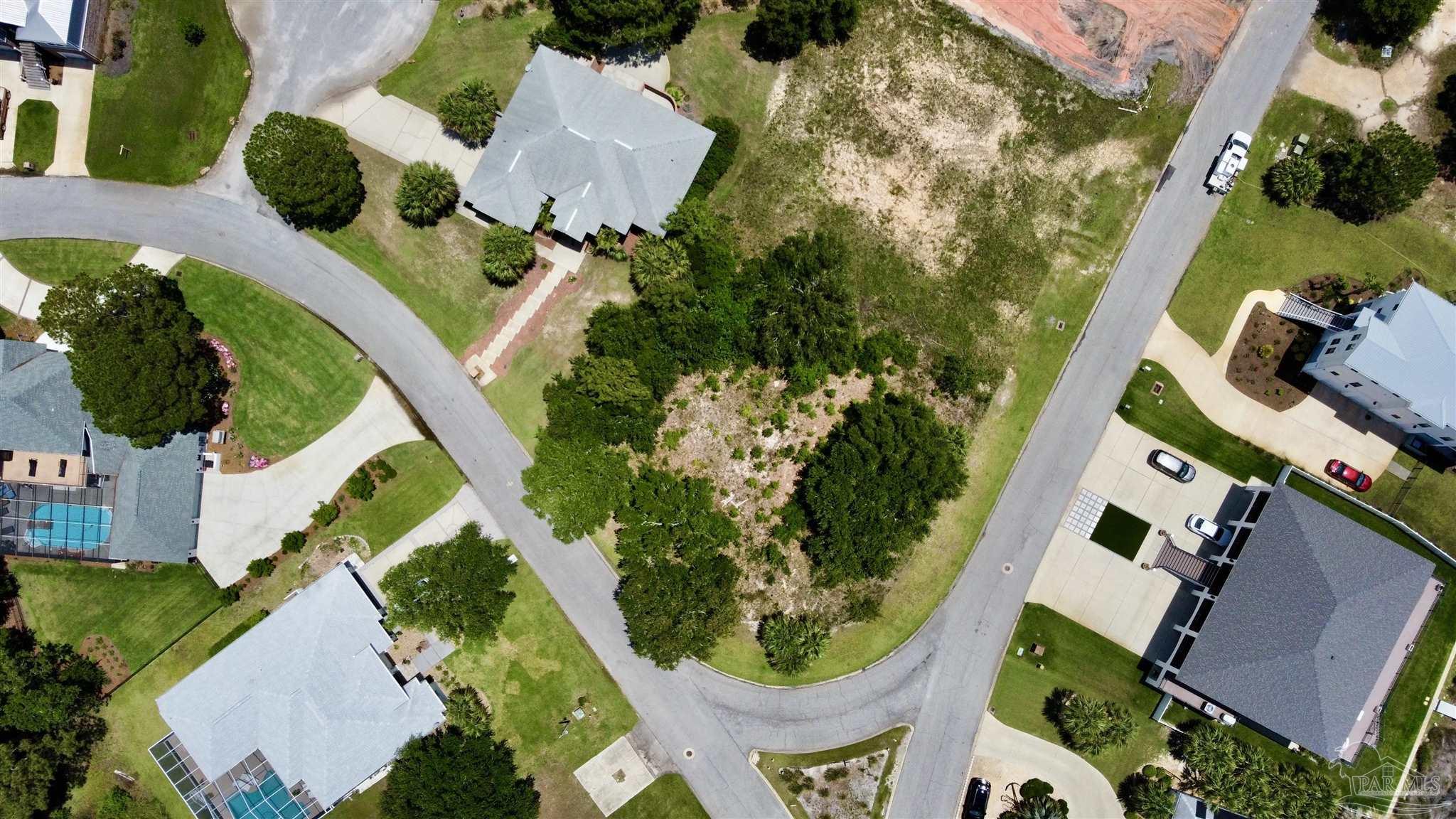 4136 Madura Road Gulf Breeze, FL 32563 - Photo 5 of 10 an aerial view of residential house with outdoor space and swimming pool