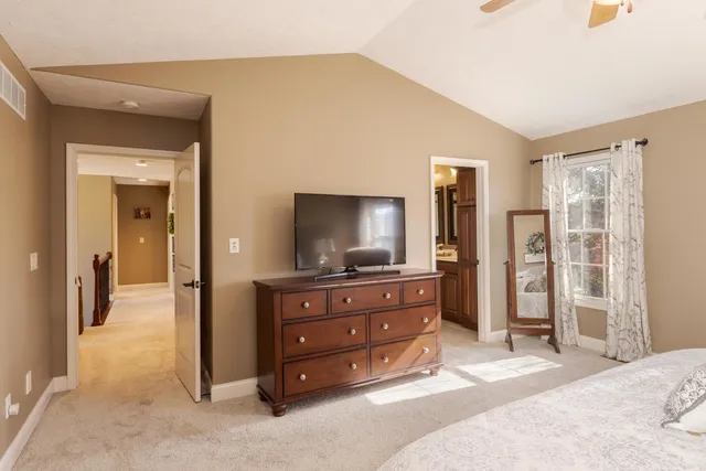 a bathroom with a sink double vanity and a mirror