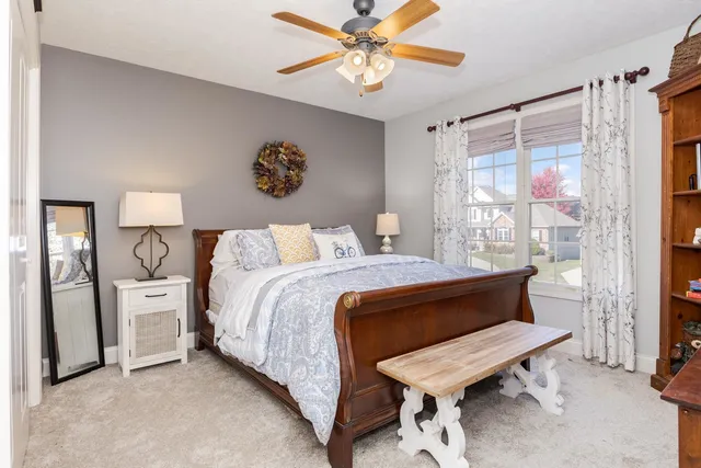 a bedroom with a bed and a shower