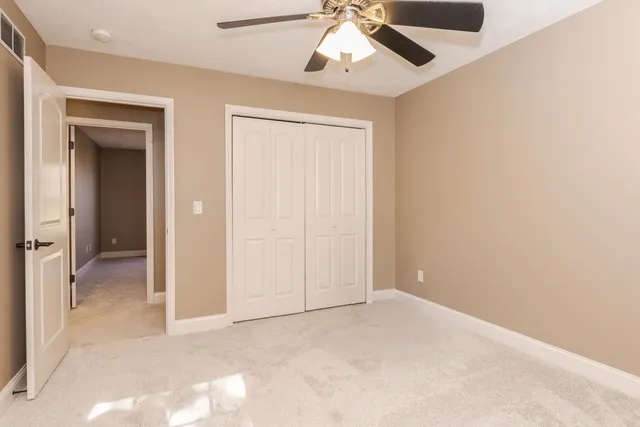 a kitchen with a table and chairs in it