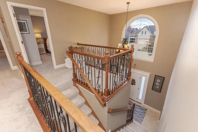 a view of an empty room with a fireplace