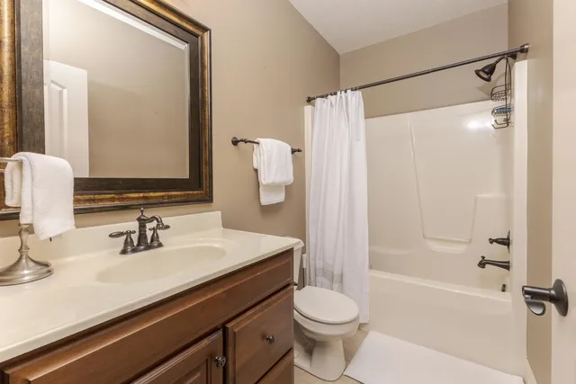 a view of a chairs and table in the balcony