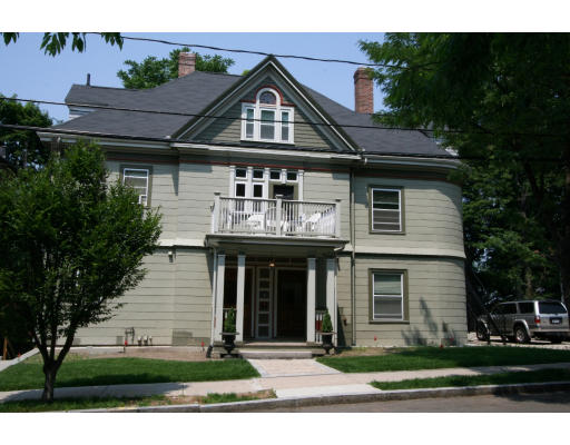 139 Winthrop Road Brookline, MA 02445 - Photo 1 of 1 a front view of a house with a yard