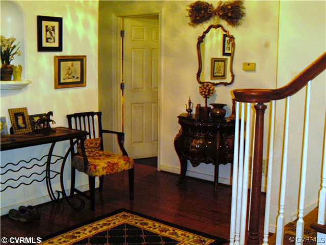 Foyer - wide foyer with hardwood floors