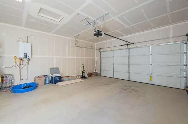 a front view of a house with a garage