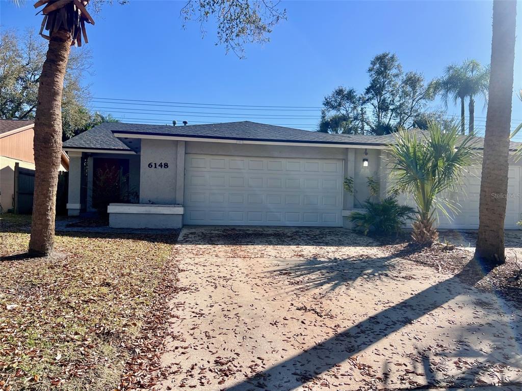 a view of a backyard of the house
