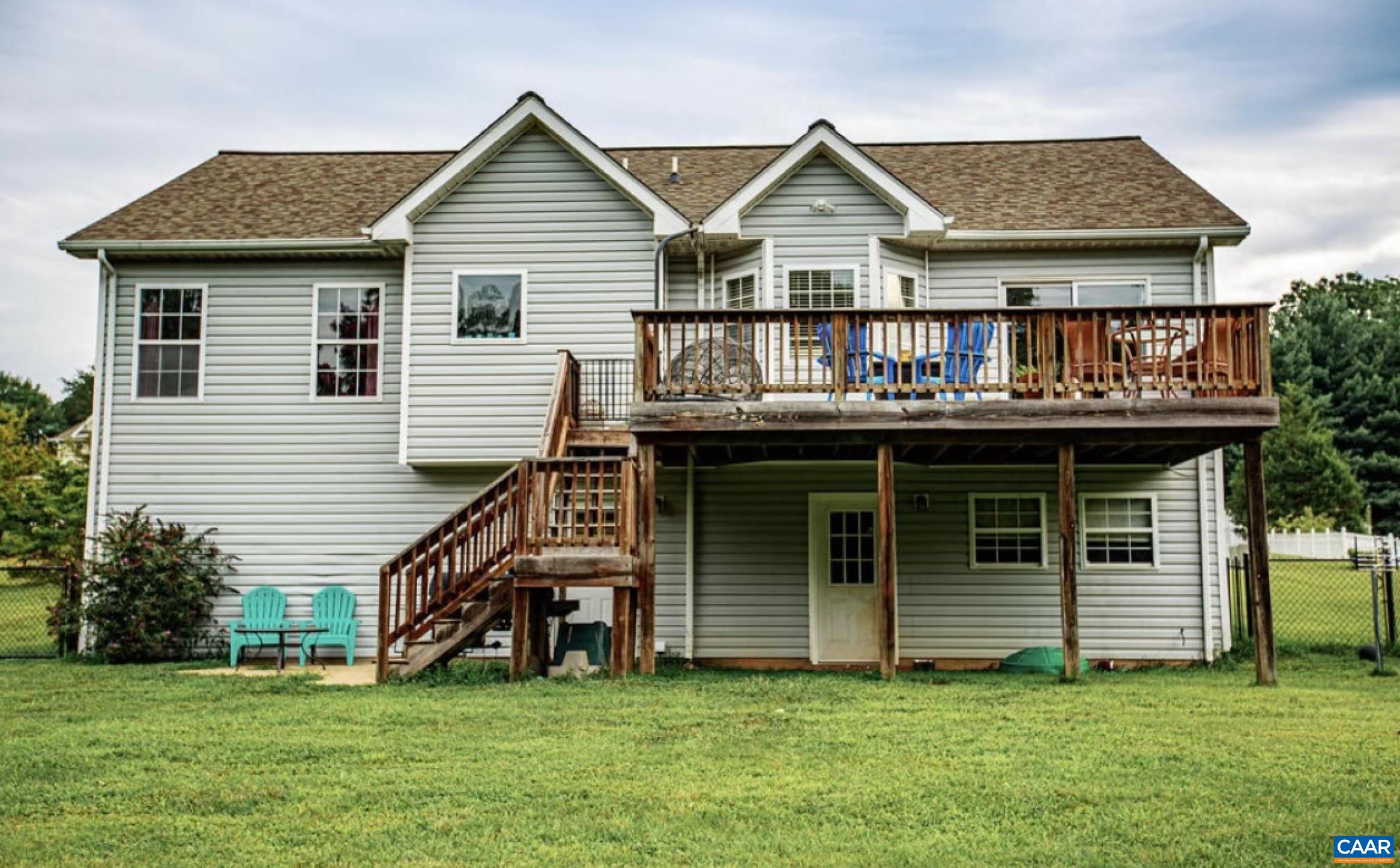 166 Oak View Road Barboursville, VA 22923 - Photo 1 of 46 a view of a house with a yard and deck area